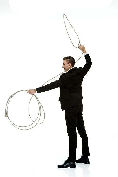 istock Businessman lassoing 537350699