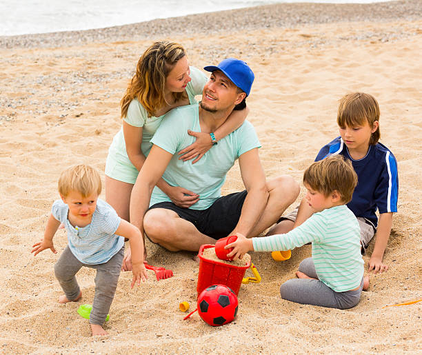istock Parents with kids at seaside 537350991