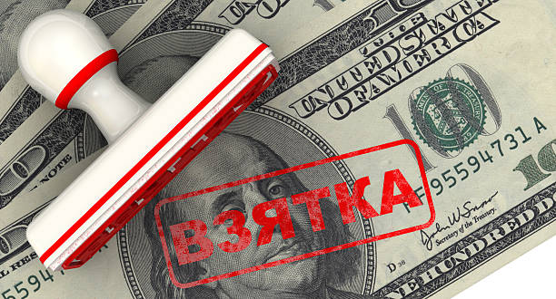 istock Bribe. Seal and imprint on American banknote 537351037