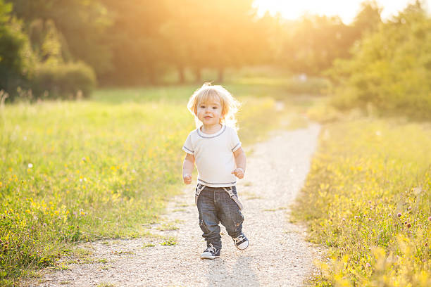 istock Happy little boy running and having fun 537351640