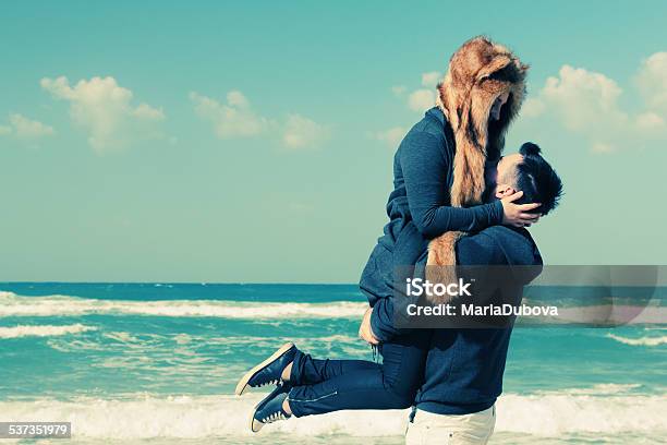 Beautiful Young Couple Relaxing Outdoor Stock Photo - Download Image Now - Couple - Relationship, Sensuality, Vacations