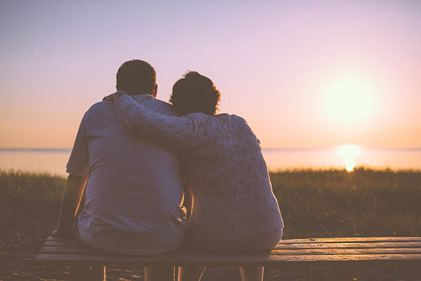 istock Senior couple enjoy the sunset together 537352771