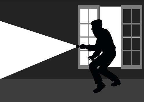 Silhouette illustration of a thief break into the house through window