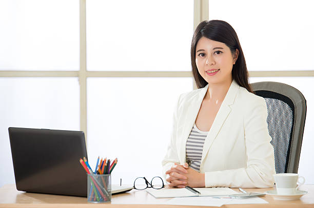 istock Asian Smiling business women working on laptop 537358234
