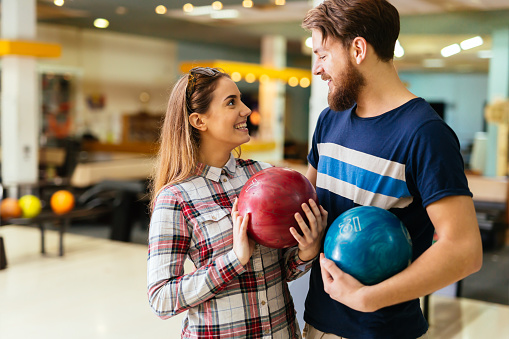 Beautiful couple in love dating and bowling