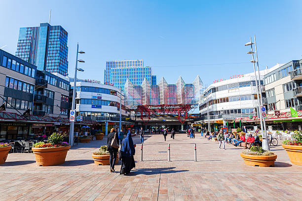 railway station of Almere, Netherlands Almere, Netherlands - April 19, 2016: railway station of Almere with unidentified people. Almere is a fast growing, planned city. With a population of about 200,000 it is the 7th largest Dutch city almere photos stock pictures, royalty-free photos & images