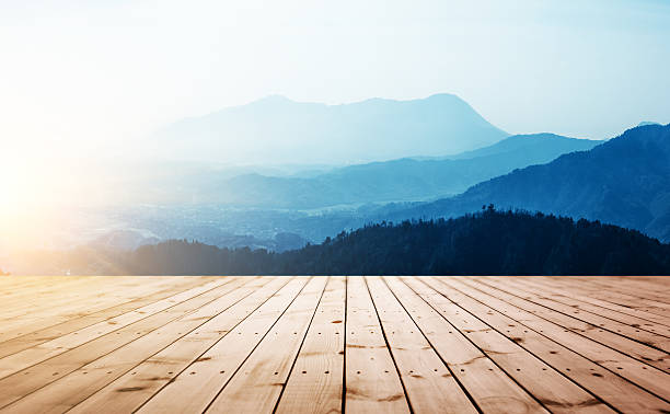 istock Wooden board with mountain background 537360154