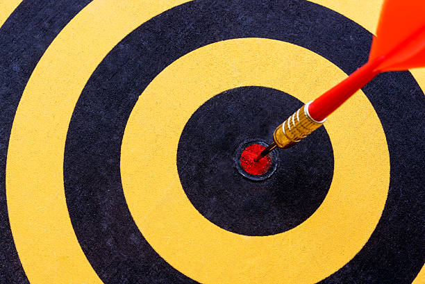 istock closeup dart target with arrow on bullseye 537360288