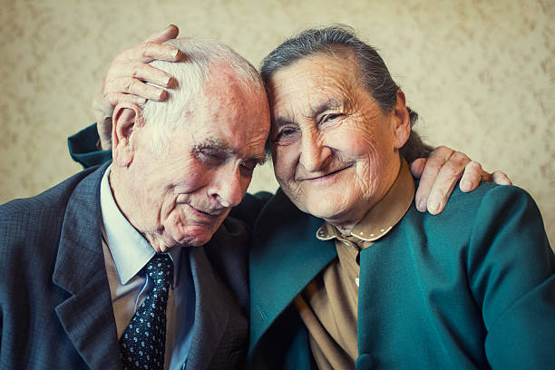 istock 80 plus year old married couple posing for a portrait 537360492
