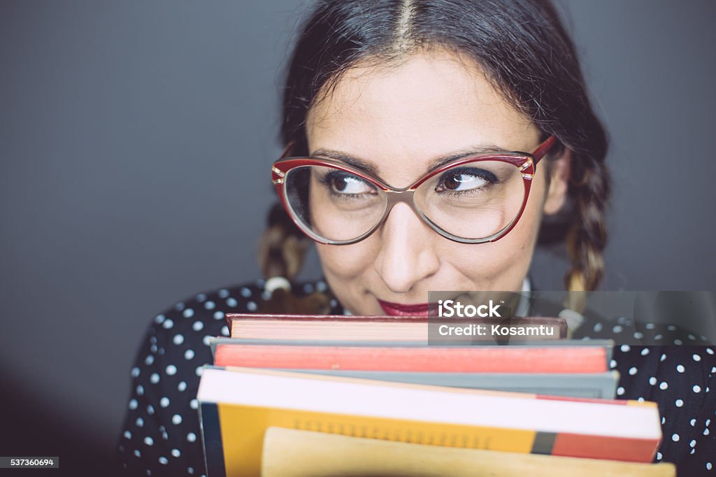 Shy Nerd Hiding Behind Books Stock Photo - Download Image Now ...