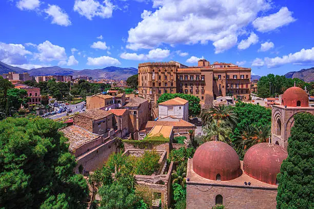 Lovely View on the old cloister of saint john in Palermo, Sicily, Italy on a warm spring morning. Citiview with view on the palace in the background