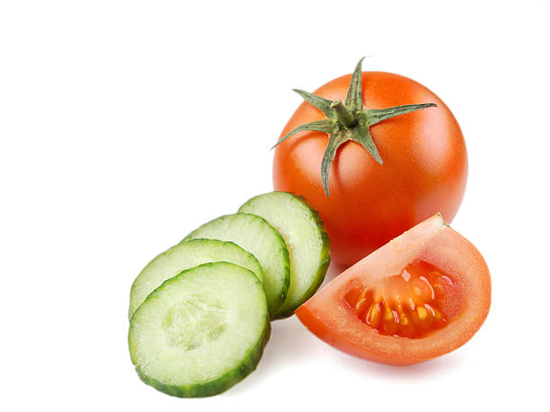 istock Juicy Isolated Tomato in white background 537362412