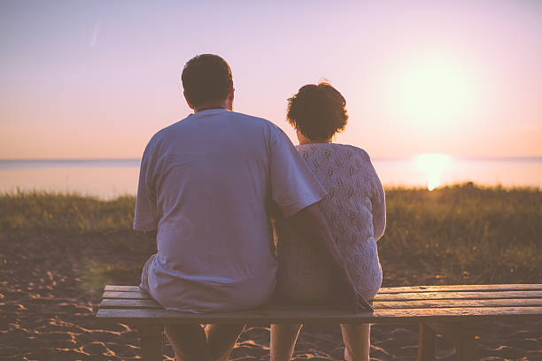istock Senior couple enjoy the sunset together 537365869