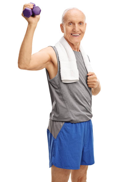 istock Senior man in sportswear holding dumbbells 537366974