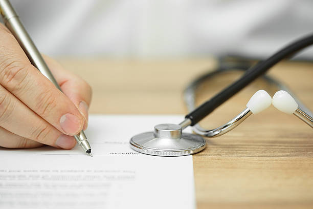 istock doctor's hand  is writing prescription for patient diagnose 537367454
