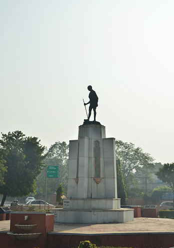 Jaipur, India - December 31, 2014: Mahatma Gahdhi statue in the center of Jaipur, India on December 31, 2014. Gandhi led India to independence and inspired movements for civil rights and freedom across the world.