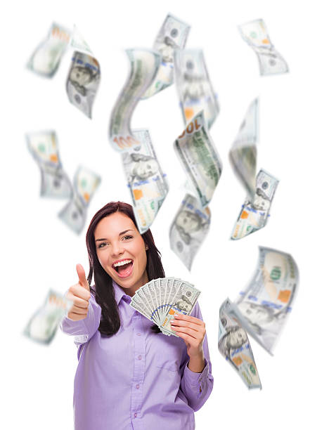 istock Happy Woman Holding the $100 Bills with Many Falling Around 537369267