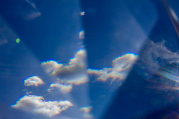 istock Abstract fractured blue sky with white clouds 537369779