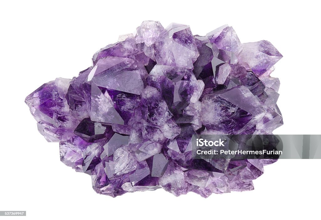 Amethyst Directly Above Over White Background Amethyst directly above over white background, a violet variety of quartz, often used in jewelry. Silica, silicon dioxide, SiO2. Amethyst Stock Photo