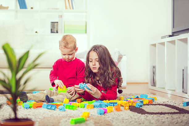 istock Two Children Are Playing On The Floor 537370375