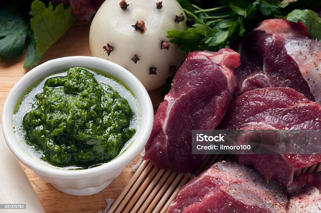 ingredients for boiled meat with green sauce ingredients for the preparation of meat broth with veal and different vegetables Boiled Stock Photo