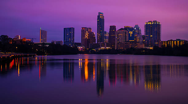 istock Close up Mirror Image Pink Austin Skyline Reflections Town Lake 537370923