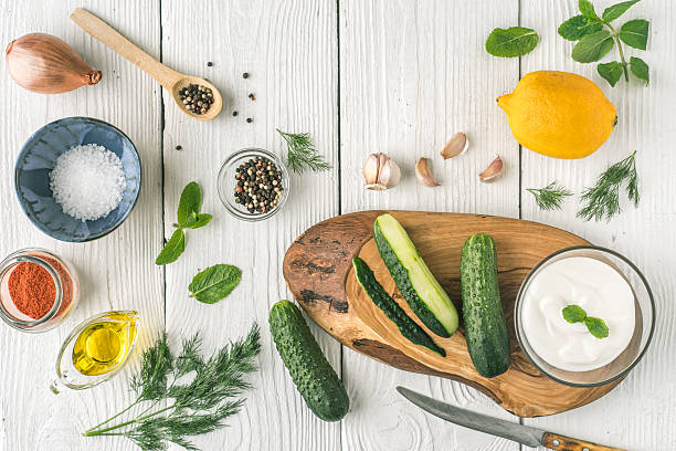 istock Ingredients for tzatziki preparation on the white  table top view 537372398