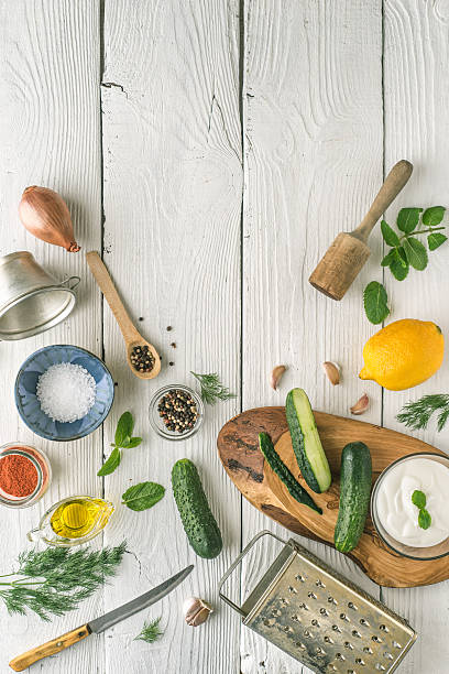istock Ingredients for tzatziki preparation on the white  wooden table 537372530