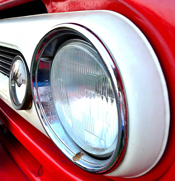 istock Side view of red truck headlihgt 537372616