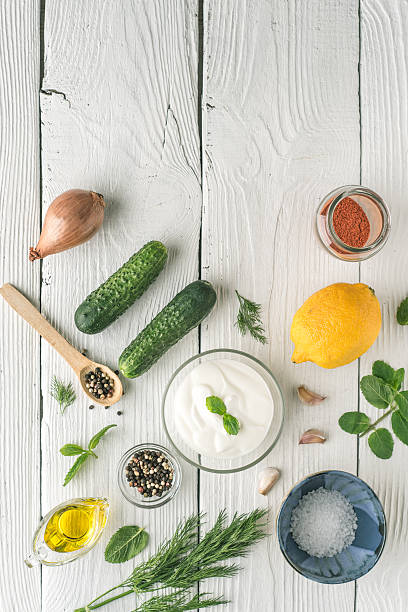 istock Ingredients for tzatziki preparation on the white  wooden table  vertical 537372848