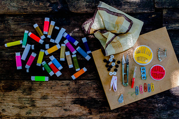 istock Thread and sewing Old  tools on the old wooden background. 537373076