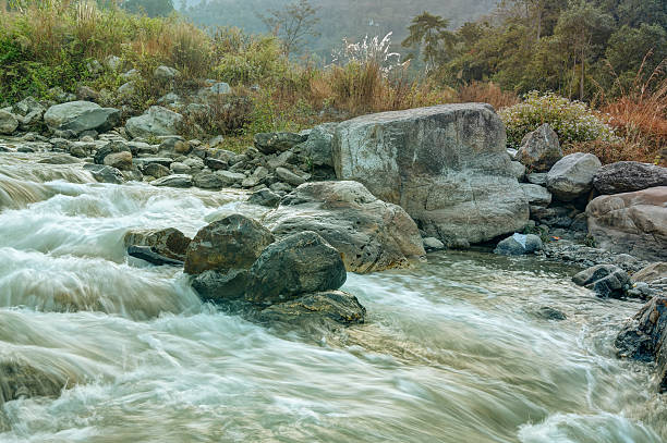 istock River water flowing through rocks at dawn 537375820