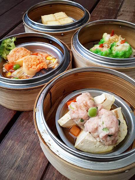 istock dim sum in bamboo steamer, chinese cuisine 537376362