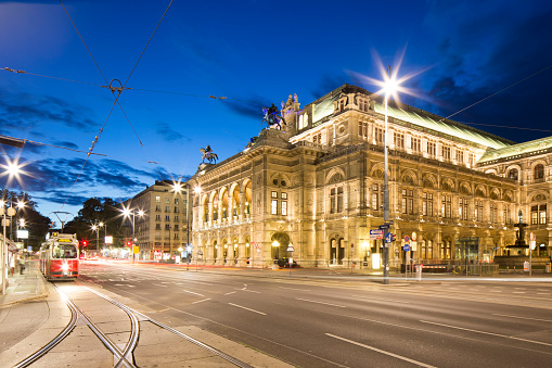 Vienna State Opera in the evening at twilight. The opera house was the first major building on the Vienna Ringstraße commissioned by the Viennese \
