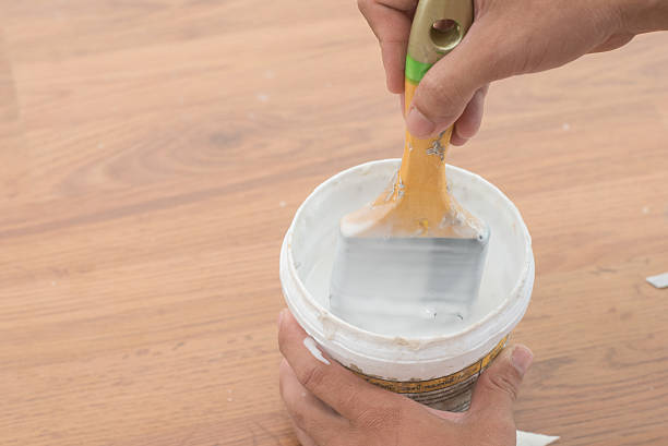 istock handyman painting on the wall 537377926
