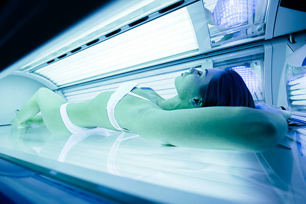 istock Beautiful woman lying in solarium 537381390
