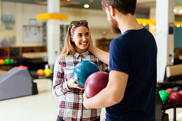 istock Beautiful couple dating and bowling 537381452