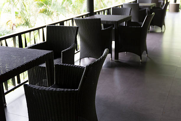 istock black wicker chair and table at balcony 537381680