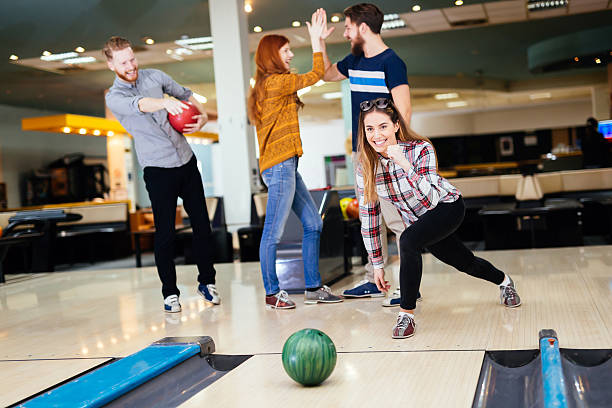 istock Friends bowling at club 537381800
