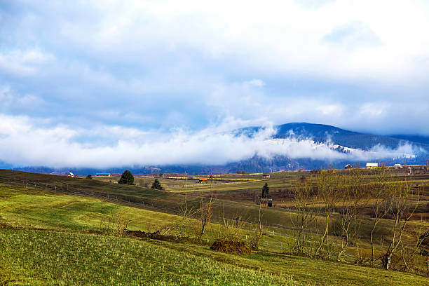 istock Countryside meadows with fog in the mountain peak 537382608