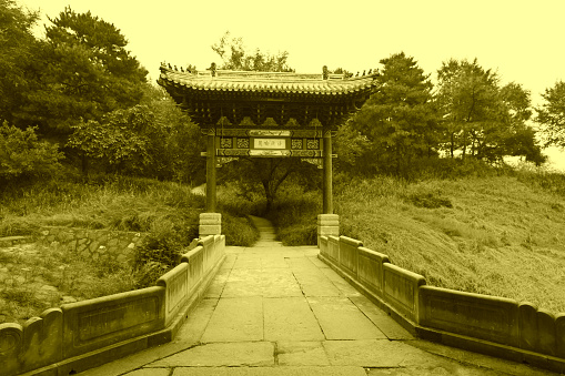 stone archway and stone bridge at a Chinese ancient garden