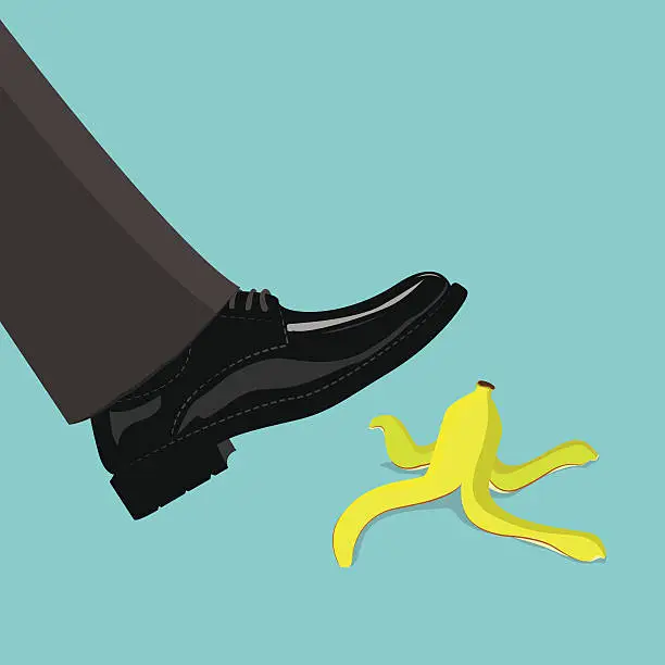 Vector illustration of Man step on banana peel, business concept