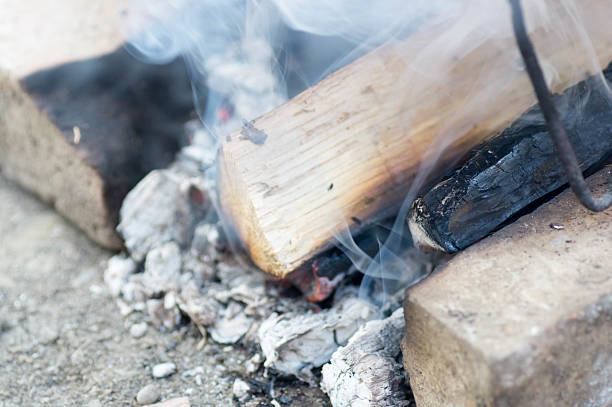 istock Macro shot of smoking and burning wood 537385604
