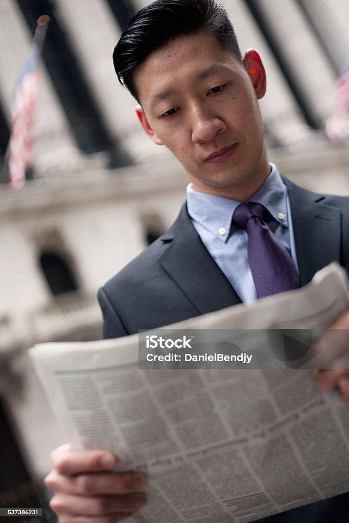 Asian Man in Financial District in New York City Asian Man in Financial District in New York City. 2015 Stock Photo