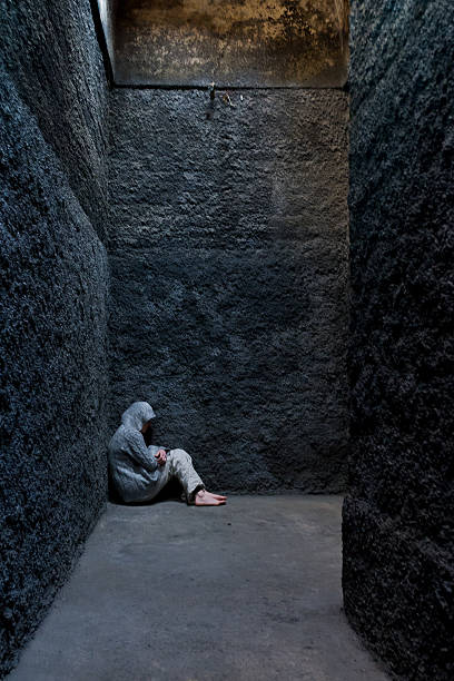 istock Scared, insane woman hiding in a corner 537387248