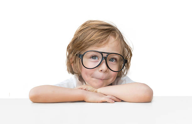 Cute little boy with toy glasses isolated on white background