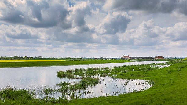 istock River Hull at high tide and surrounding fields in summer. 537387456