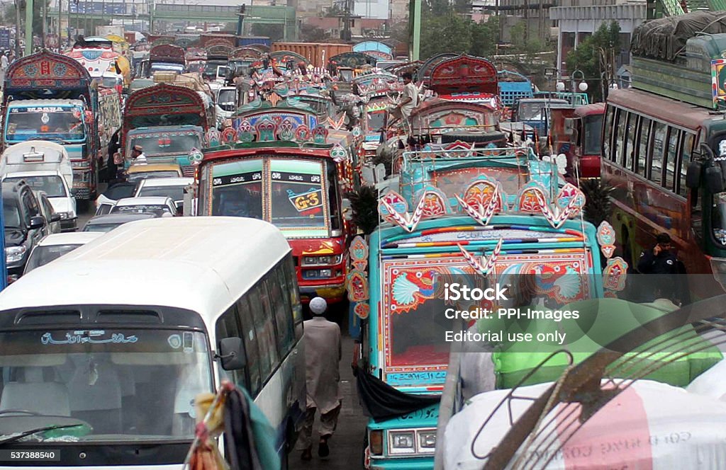 Traffic jam due to protest of Maripur residents Karachi, Pakistan - June 01, 2016: Large numbers of motors stuck in traffic jam due to protest of Maripur residents against shortage of drinking water and prolonged electric load shedding in their locality, nearby Netty Jetty bridge in Karachi. Horizontal Stock Photo