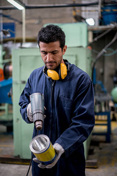 istock Man working at a metal factory 537388672