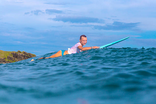 istock Surfer girl on Amazing Blue Wave 537389025
